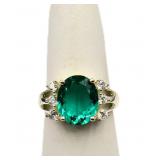 Oval cut teal sapphire ring, lab created