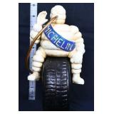 Cast iron 9in Michelin man on tire