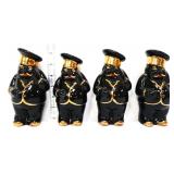 Lot of 4 6in black figural shakers