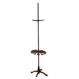 Vintage cast iron general store broom display rack
