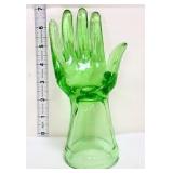 Green glass jewelry hand