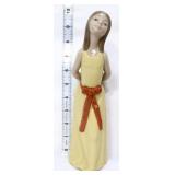 Lladro 10in Naughty Girl figure in yellow dress