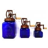 Trio of cobalt glass butter churns