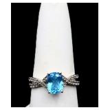 Sterling oval cut blue topaz ring, lab created