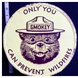 Round metal Only You Smokey Bear sign