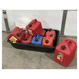 PLASTIC TUB FULL OF GAS CANS & NOZZLES