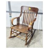 ANTIQUE OAK PRESSED BACK ROCKING CHAIR