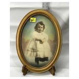 VINTAGE OVAL WOOD FRAME OF KID 16.5"X22.5"