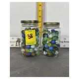 2 JARS OF MARBLES