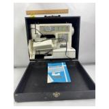 NELCO SEWING MACHINE IN CARRY CASE