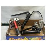 SEVERAL GREASE GUNS