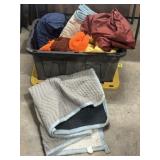 MOVING BLANKETS IN BLACK PLASTIC TUB