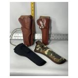 SEVERAL PISTOL HOLSTERS