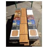 150 SQ FT + / - LAMINATE FLOORING W ATTACHED PAD