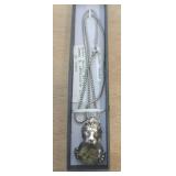 STERLING - 22" CHAIN & PENDANT-EYES ARE 18KT GOLD