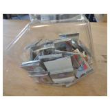 CONTAINER OF CIGARETTE ROLLING PAPERS