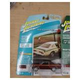JOHNNY LIGHTNING - MIB - 76 DODGE ASPEN 2021