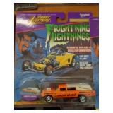 JOHNNY LIGHTNING MIB HAULIN HEARSE 1996