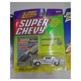 JOHNNY LIGHTNING MIB 63 IMPALA 1999