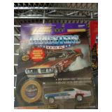 JOHNNY LIGHTNING MIB - 77 REVELLUTION 1995