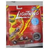 JOHNNY LIGHTNING MIB TRIPLE THREAT 1995