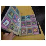 180 YU-GI-OH CARDS IN BINDER