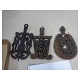CAST IRON TRIVETS - 1 MARKED WILTON