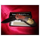 THUMB OPEN LOCKBACK KNIFE
