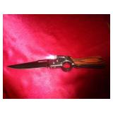 SPRING OPEN KNIFE WITH LIGHT