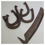 CAST IRON HORSESHOES & SCYTHE BLADE