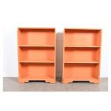 Two Orange Painted Wooden Bookcases