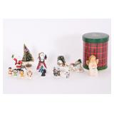Various Christmas Figurines With Plaid Tin