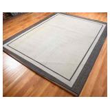 Beige And Black Bordered Area Rug