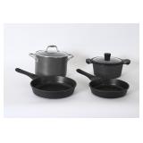 Assorted Black Pots And Pans With Lids