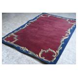 Decorative Red and Blue Bordered Area Rug