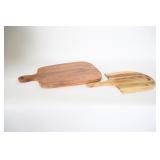 Two Wooden Pizza Peels And Cutting Boards