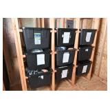 Black Plastic Storage Bins On Wooden Shelving
