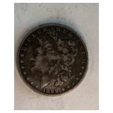 1899     Morgan Silver Dollar