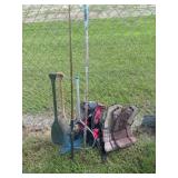 Group of Life Jackets, Fishing Poles, Paddles