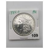 1884 O AU Morgan Silver Dollar Coin