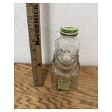 ANTIQUE GRAPETTE CLOWN BOTTLE WITH ORIGINAL LABEL