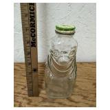 ANTIQUE GRAPETTE CLOWN BOTTLE WITH LID
