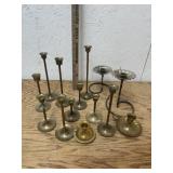 GROUP OF BRASS CANDLE HOLDERS
