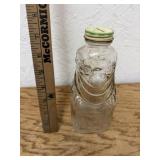 ANTIQUE GRAPETTE CLOWN BOTTLE WITH LID
