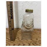 ANTIQUE GRAPETTE CLOWN BOTTLE WITH LID