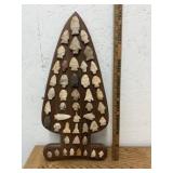 LARGE GROUP OF ARROWHEADS GLUED ONTO BOARD IN SHAP