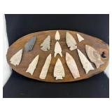 Very Nice group of 13 Arrowheads glued to frame In