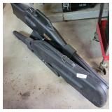 2 GUN CASES ON RACK
