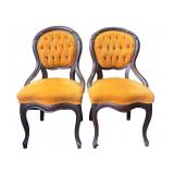 Pair Of Orange Cushioned Chairs