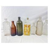 7 Antique Beer, Medicine, and Gin Bottles.